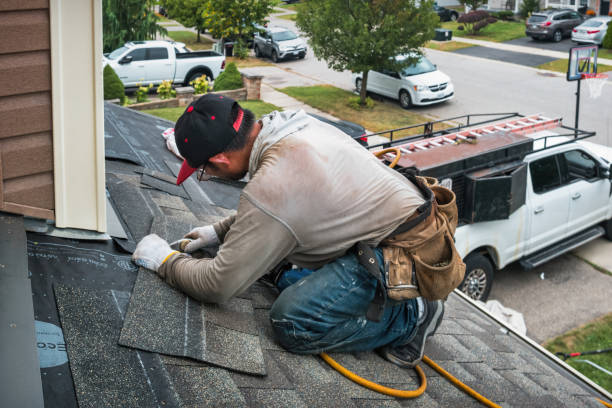 Professional Hail Damage Roof Repair technician working in Tannersville, VA